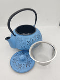 The Cildan Tea Merchant, The tea merchant, Cast iron teapot 600ml Autumn leaf Light blue & accessories