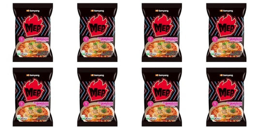 Multiple packages of Mie noodles with a red logo on a black background