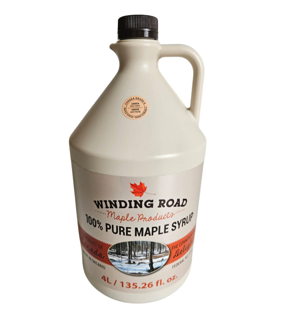 Gallon jug of Winding Road Maple Products maple syrup on a white background
