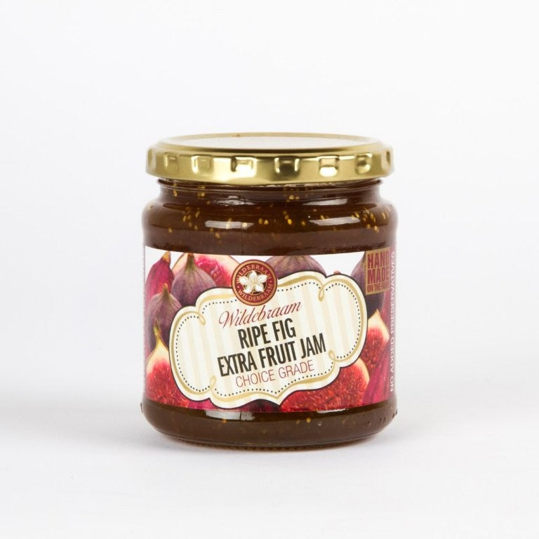 Jar of Ripe Fig Extra Fruit Jam with a gold lid on a white background