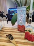 Seasons Delight loose leaf tea packaging, Cildan tea merchant gingerbread tea displayed on a counter