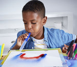 blowpens being used by young boy