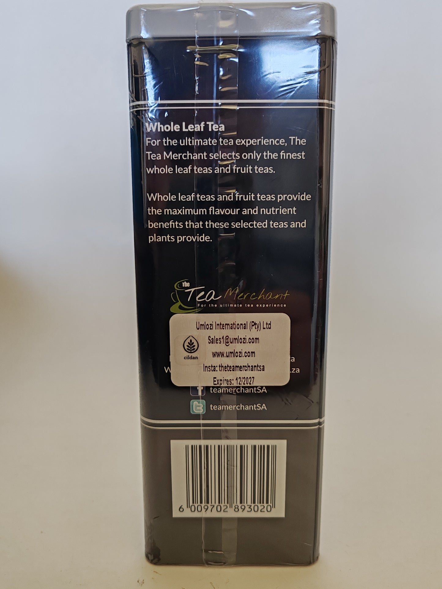 Back of a tea package with text and branding on a white background