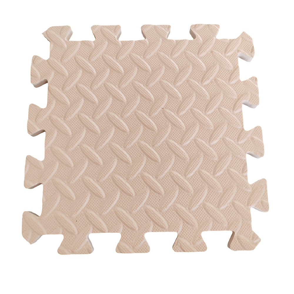 A cream Eva Foam coloured mat with a textured surface, consisting of 6 interlocking pieces.