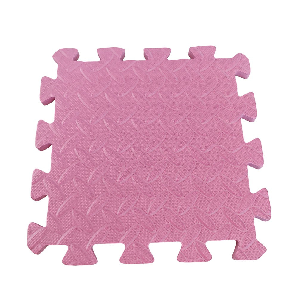 A pink Eva Foam coloured mat with a textured surface, consisting of 6 interlocking pieces.
