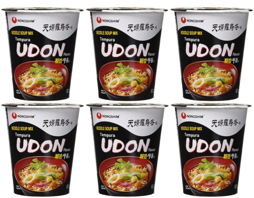 Six containers of Nongshim Udon Tempura noodle soup mix on a white background